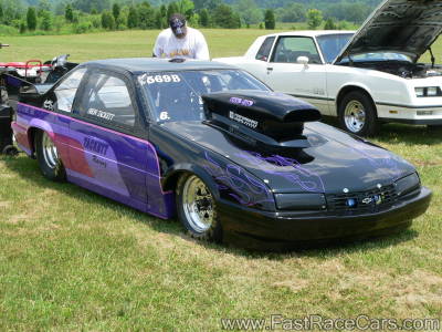 Black and Purple Beretta Drag Car