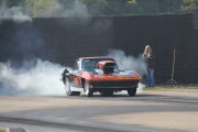 Black Corvette Doing Burnout