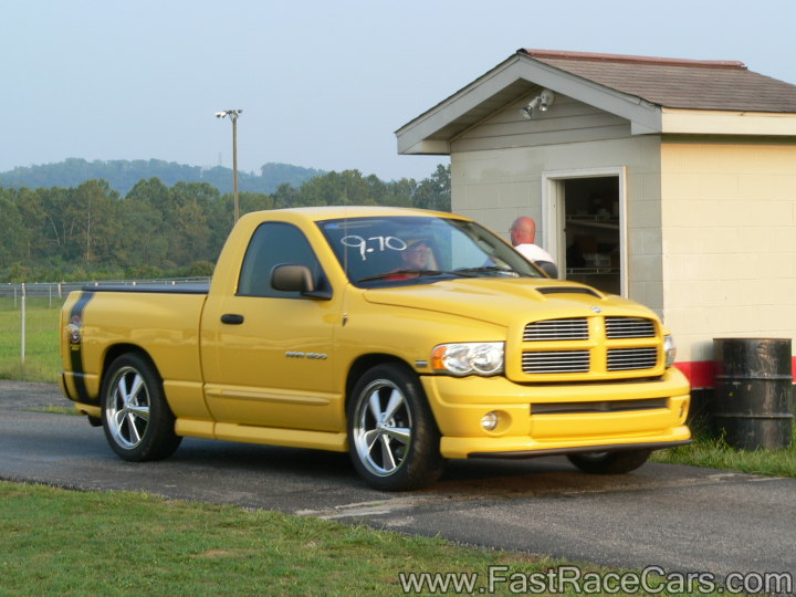 Yellow Dodge Ram Truck with Rumble Bee Package